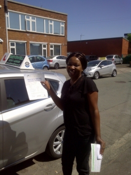 Proudly holding her Pass Certificate.   great drive with few faults.  MAY 2012...