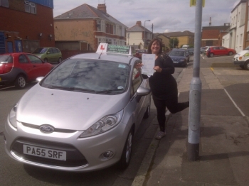 Proudly holding her Pass Certificate qfter n excellent drive .  No more relying on Pubic Transport with 4 children! AUGUST 2012...